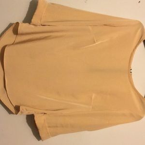yellow blouse with back zipper detail
